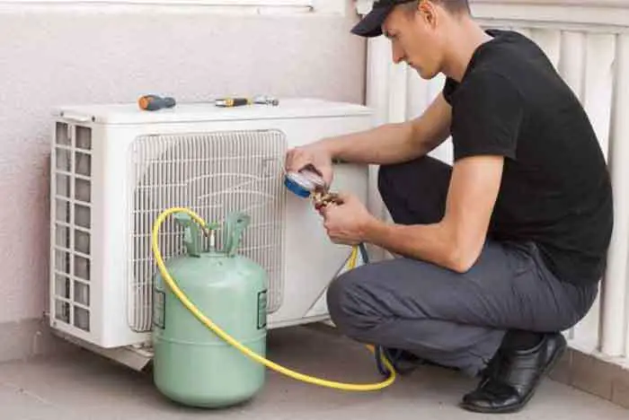 How is Freon removed from a dehumidifier by the professionals?